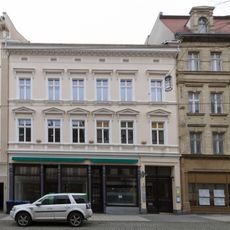 Wohnhaus mit Laden in geschlossener Bebauung und Hintergebäude (Nr. 24a) Berliner Straße 24, 24a