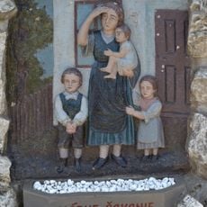 Pomník padlým v I. a II. sv. v. , reliéf figurálny III.