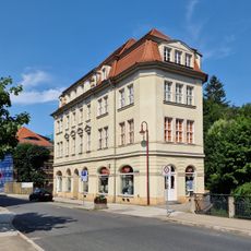 Residential and commercial building in corner location with representative facade and emphasized central risalit Schandauer Straße 25