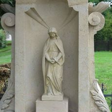 Kříž na návsi v Radimi