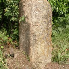 Milestone, opp. Bell Inn