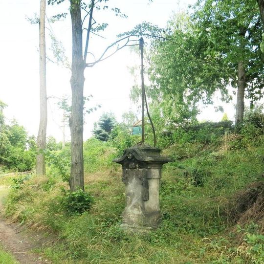 Kříž s ulomenými rameny v Zámecké ulici ve Frýdlantu