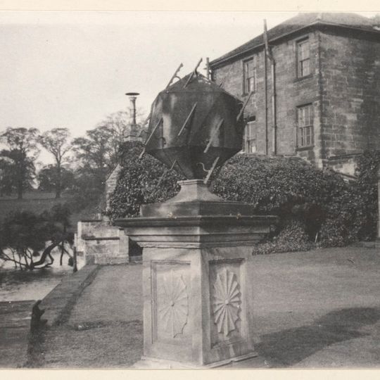 Sundial On Island To Rear Of Walton Hall