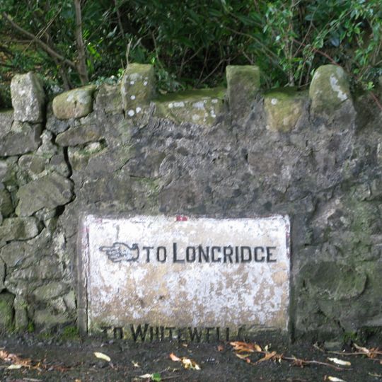 Guidestone, ExYW Lees, E of River Hodder, in wall