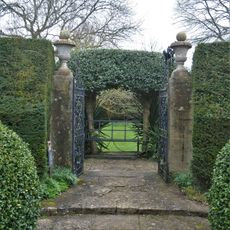 Gate Piers And Gates In The Garden At The Courts
