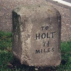 Milestone, W side of entrance drive to The Lings