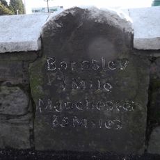 Milestone In Wall Of Petrol Station Approximately 50 Metres West Of Number 156