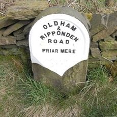 Milestone, ExYW N of Delph and house(exPH) on opp side of road