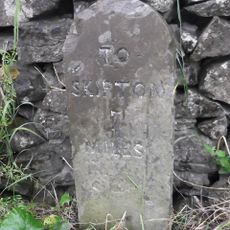 Milestone, N of Catch All Farm, 5m N of metal gate