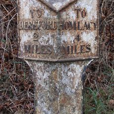 Milepost, W of Industrial estate; 200m from railway bridge