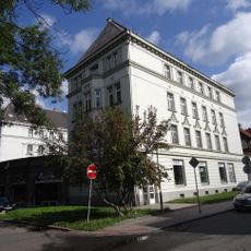 Soubor tří obytných domů a obchodního objektu