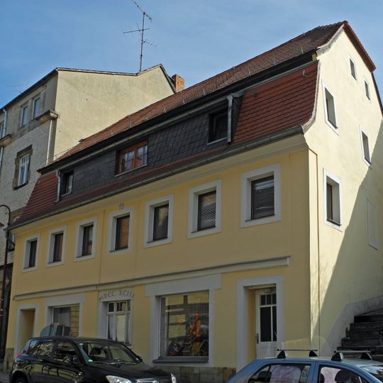 Residential building in open development with commercial extension Hertigswalder Straße 13
