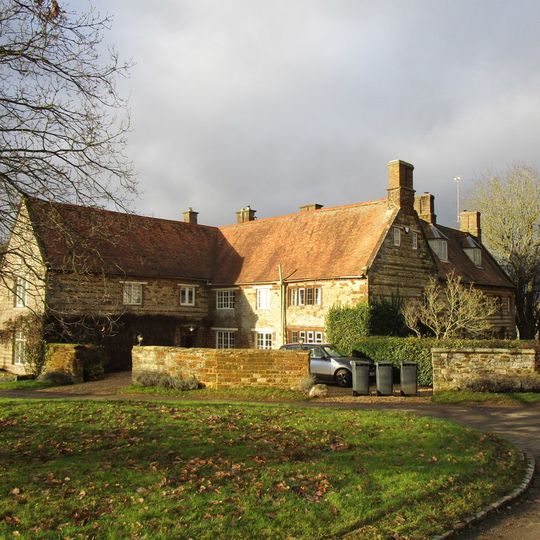 The Old Manor House And Stone Walls