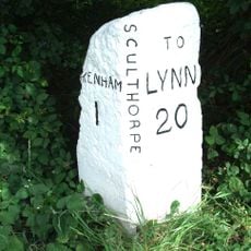 Milestone, 20yds W of jct with A148