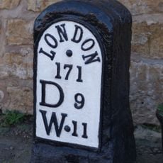 Milepost In Front Of Milestone House