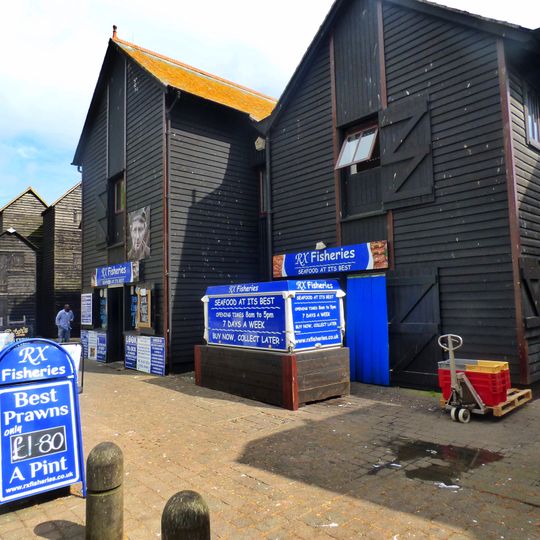 Net And Tackle Stores On Beach Including Groups L To W