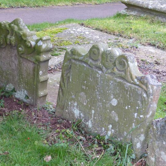 Group of three headstones approximately 3 metres south-west of south porch of Church Of St Giles