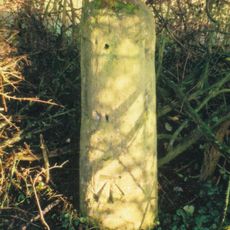 Milestone, Burford Road; at western edge of houses in Curbridge Downs; just outside 30mph zone