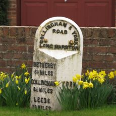 Milestone, Long Marston village, E of X rds