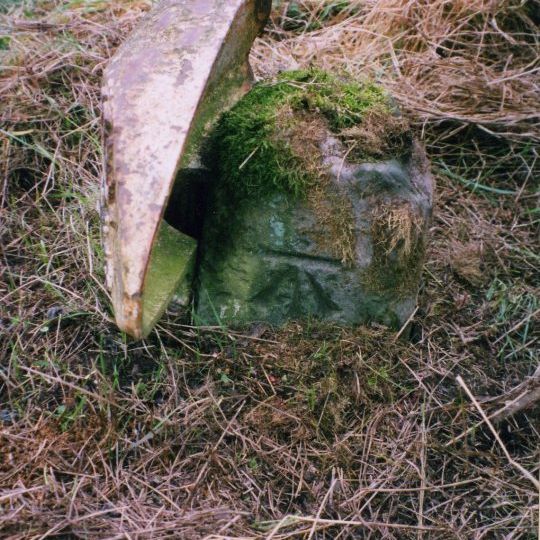 Milestone, ¾ mile S of Duddo
