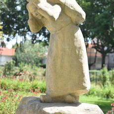 Vieille femme portant un fardeau by Célestin Manalt