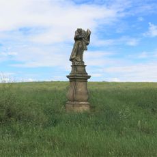 Socha svatého Prokopa u polní cesty východně od Strkovic