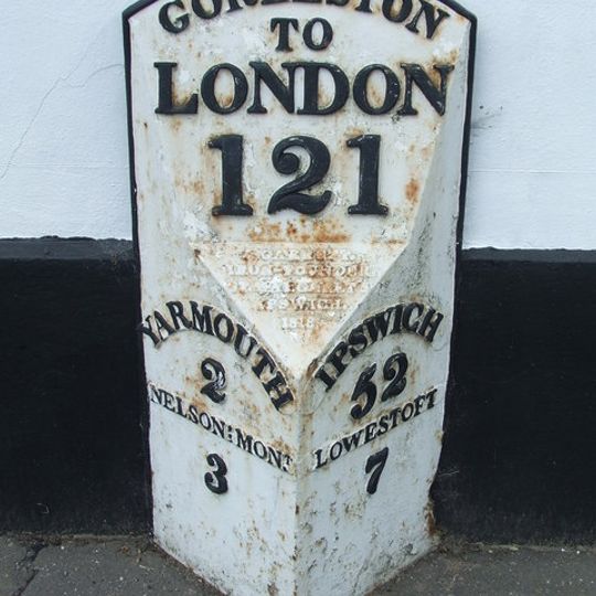 Milepost In Front Of Number 245