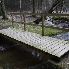 Most ulice Libušino údolí přes bezejmenný přítok Stařečského potoka poblíž Janova mlýna