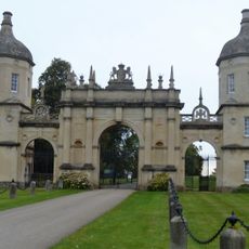 Burghley Lodges (West Gate) And Gateway Arches, Gates And Flanking Walls
