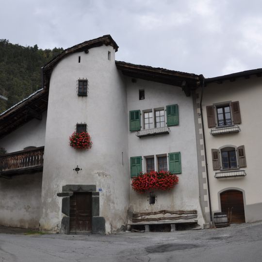 Three houses with front stair tower