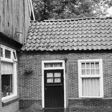 Boerderij met een bovenkamer in vakwerk