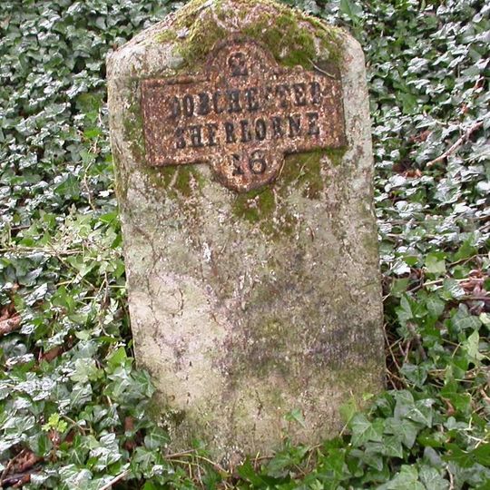 Milestone, half mile N of Charminster; 75m S of house called 'Leap Gate'.