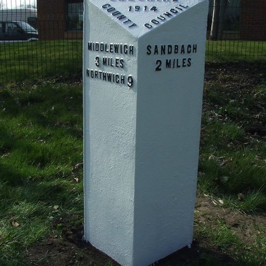 Milepost, jct of Dragons Lane and Booth Lane, by industrial estate