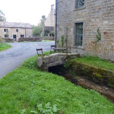 Culvert mouth, lining walls, bridge and sheepwash west of Manor House Barn