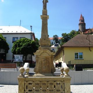 Stone cross in Bouzov