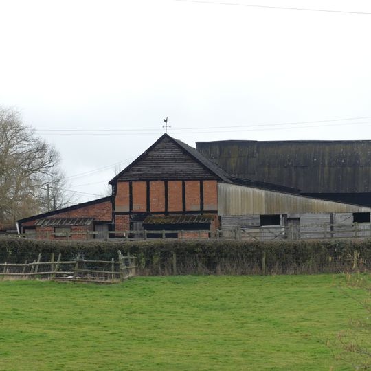 Group of two adjoining barns approximately 50 meters west of Priory Farmhouse