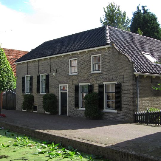 Hoekpand, boerderij met dwars woongedeelte onder schilddak