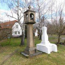 Zvonička na návsi v Křenicích