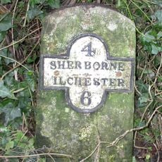 Milestone, between Adber Cross and Railway Bridge