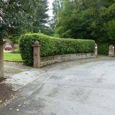 Garden walls, gateposts and gates along Church Road to Riverside and Coach-House