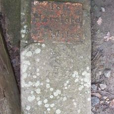 Milestone, was almost opposite the Parish Hall - in 2013 being put on wall of hall