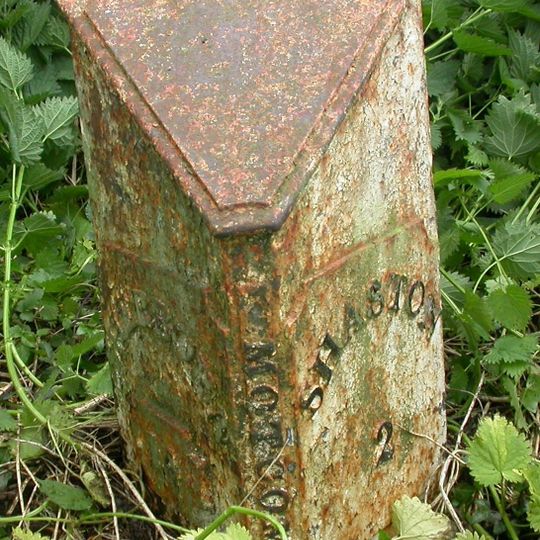 Milepost, by road jct to Stour Row and Fontmell Magna