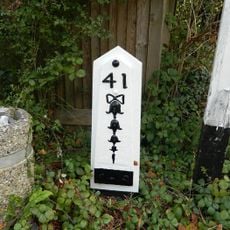 Milestone, by church at jct of High Street and Straight Halfmile