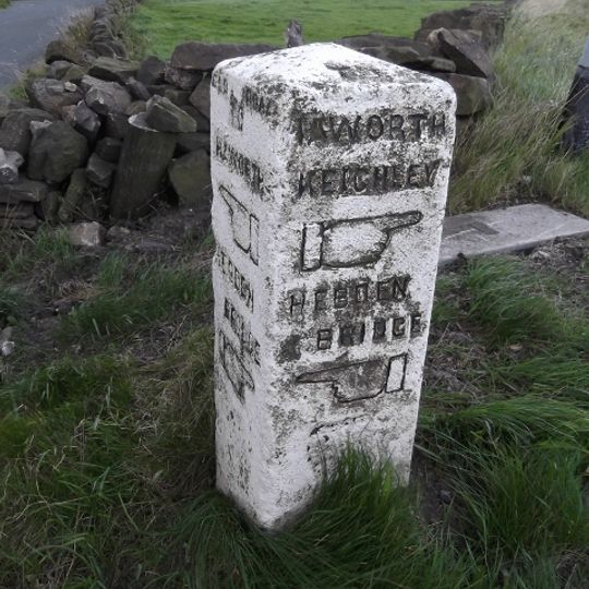 Guide post at junction with A6033