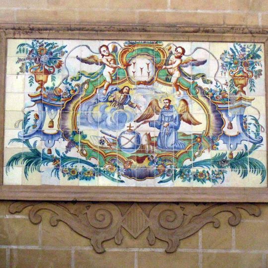 Retablo cerámico de San Francisco de Asís en plaza de San Lorenzo