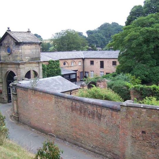 Gatehouse, flanking walls and bollards to Maer Hall
