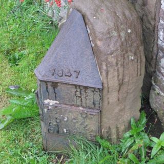 Parish Boundary Stone In Front Of Clifton Dykes Cottages